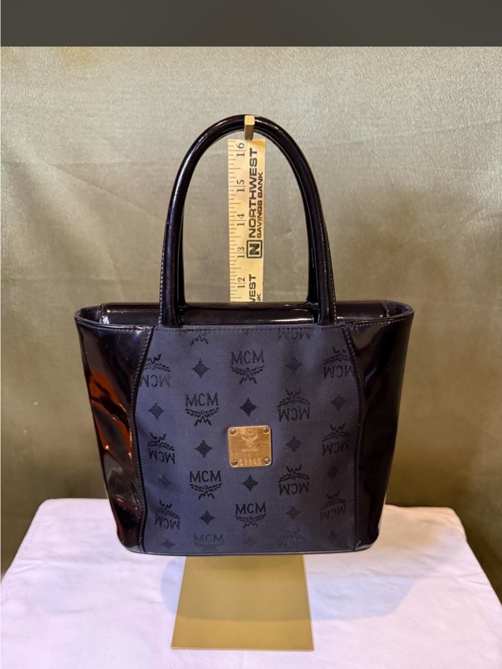 MCM Black Monogram Patent Leather Tote with Gold Logo Plate